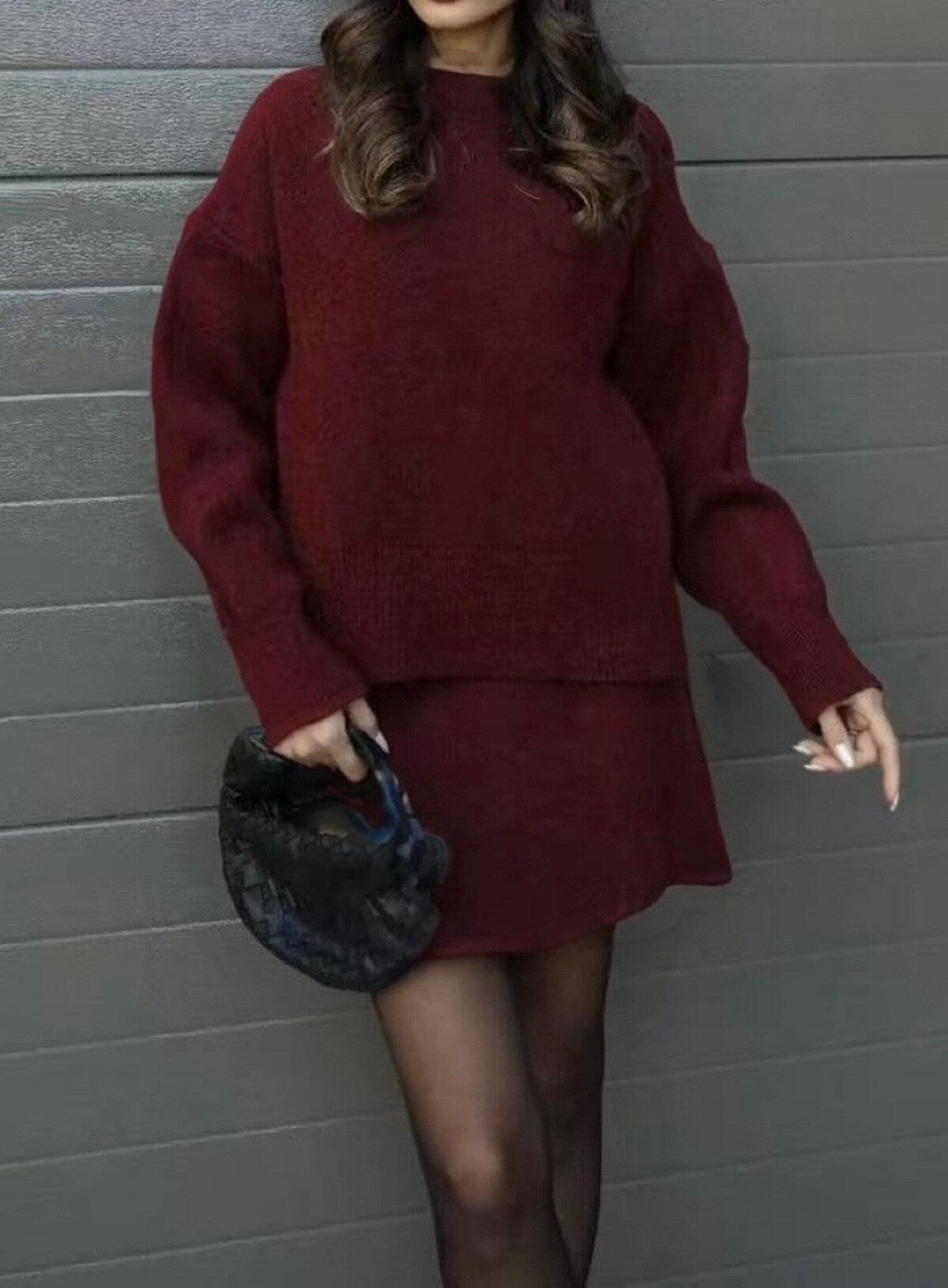 Conjunto de saia e camisola de malha